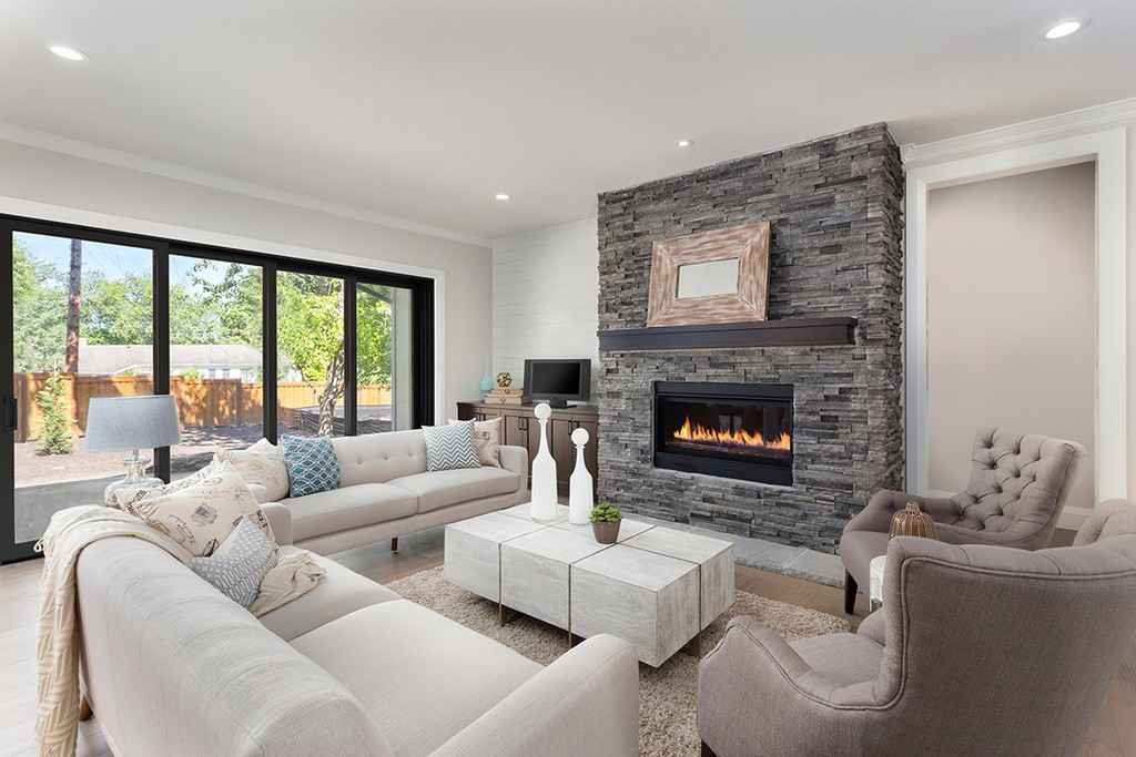 Modern living room features a fireplace with sliding door