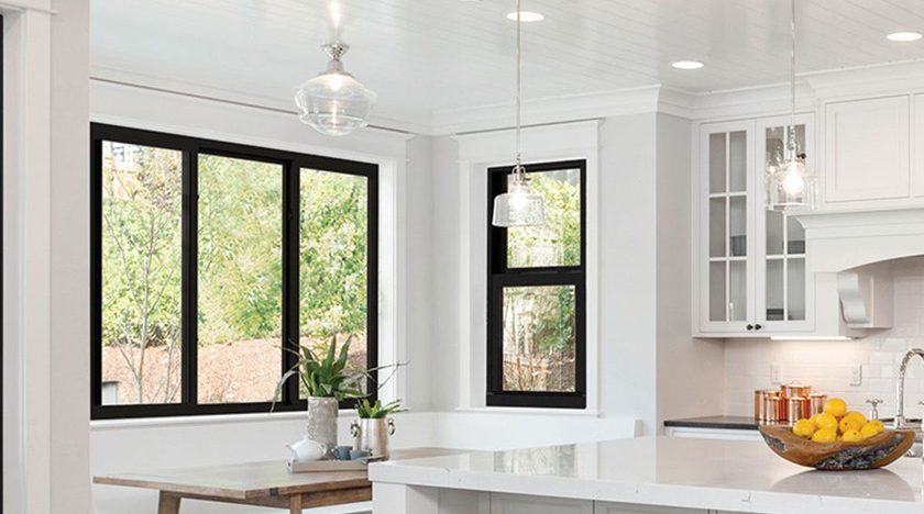 while kitchen area with impact windows